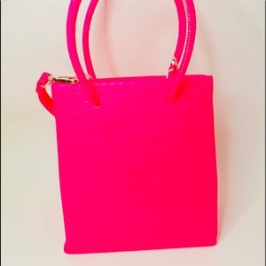 Hot pink hand croc bag